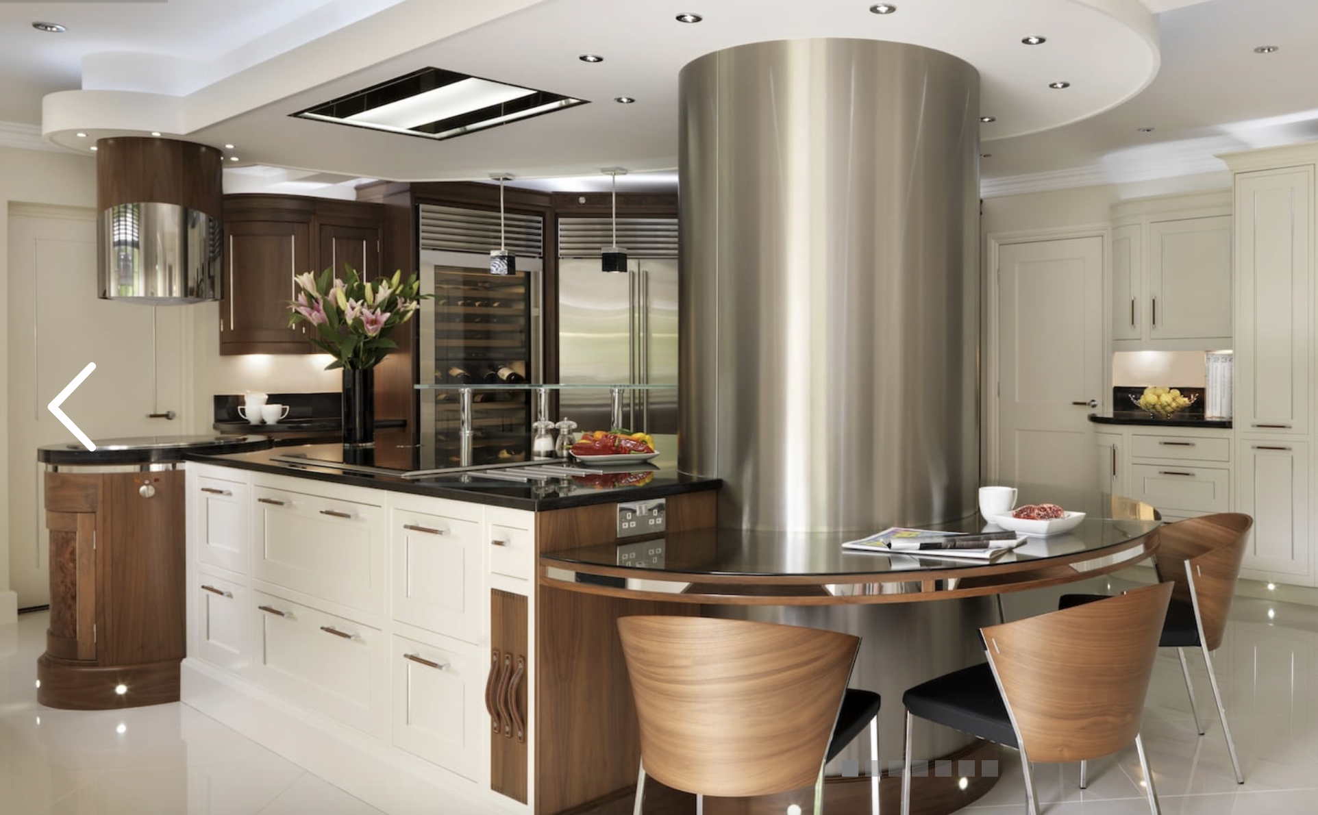 White and walnut kitchen with curved countertop